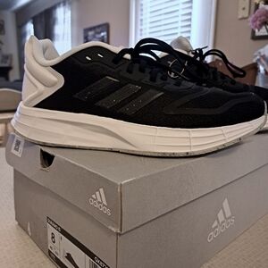 New women's Adidas Duramo 10 running shoes sz.8. They are black and white